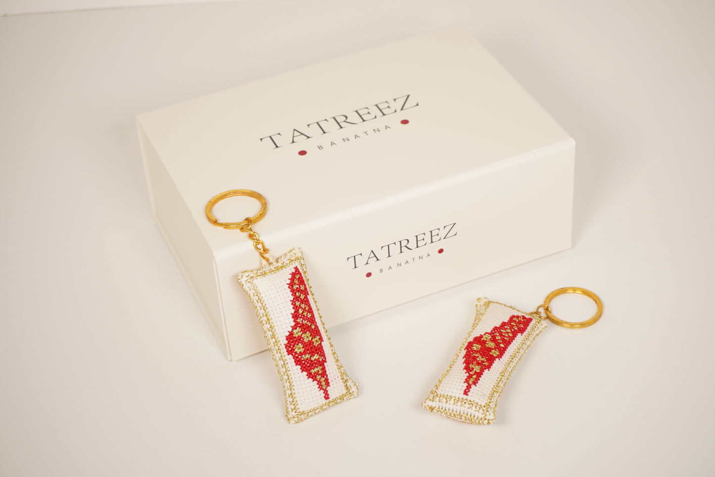 Handmade Palestinian tatreez keychain with embroidered Palestine map design, artisan accessory, cultural heritage symbol