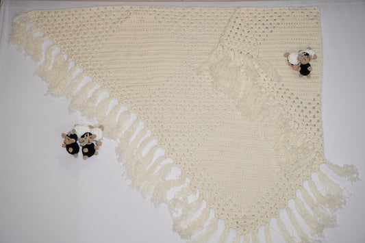 Handmade off-white crochet shawl with fringe edges, crafted with wool and cotton blend, traditional Middle Eastern design