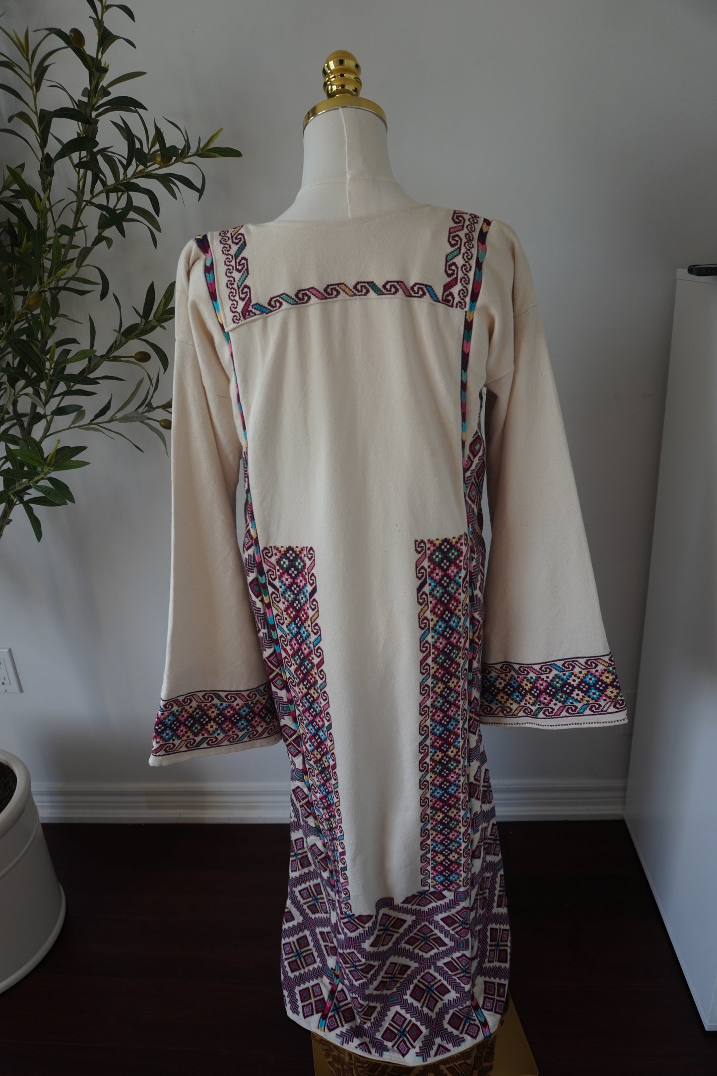 Exquisite Hand-Made Off-White Thoub with Vibrant Blue, Fuchsia, Green, Light Green, Pink, and Dark Purple Embroidery from Yata Al Khalil