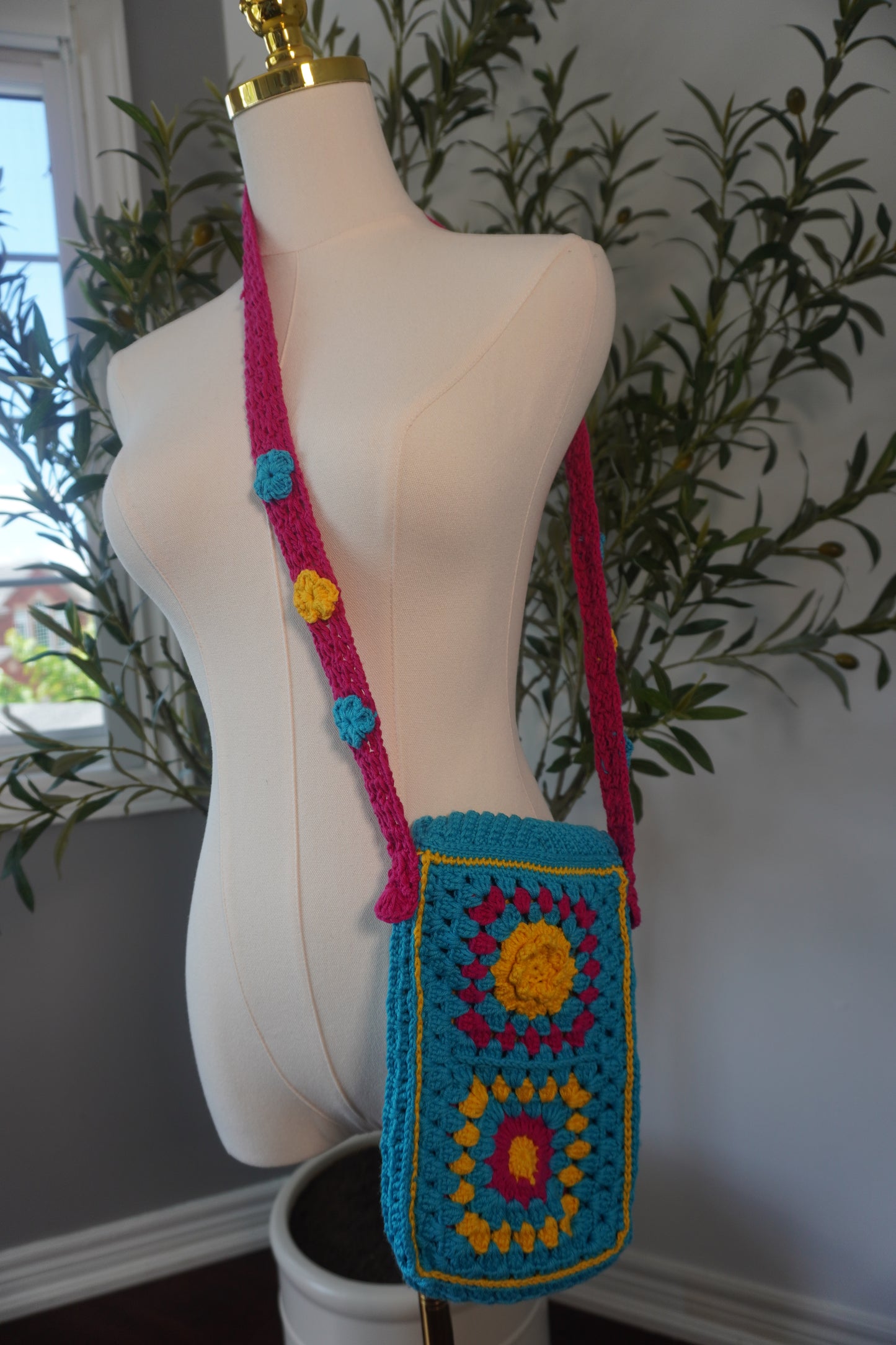 Colorful Handmade Crochet Phone Case - Fuchsia, Yellow, and Blue Floral Design