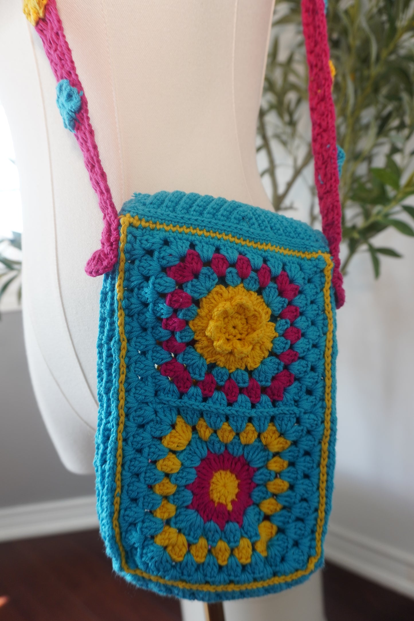 Colorful Handmade Crochet Phone Case - Fuchsia, Yellow, and Blue Floral Design