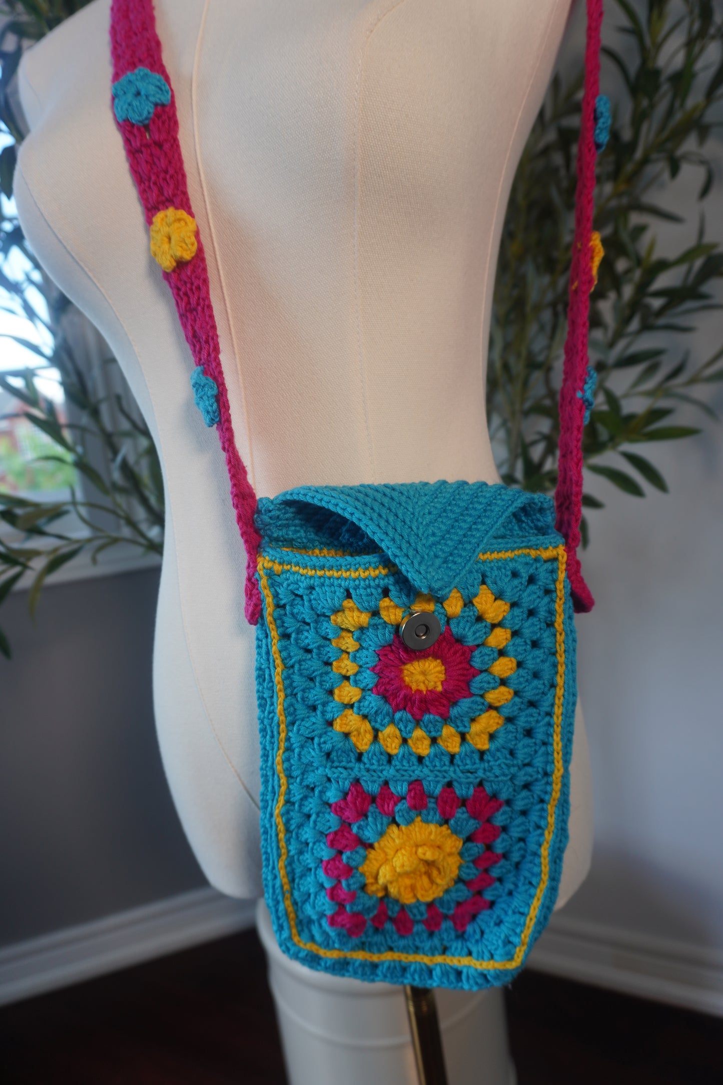 Colorful Handmade Crochet Phone Case - Fuchsia, Yellow, and Blue Floral Design