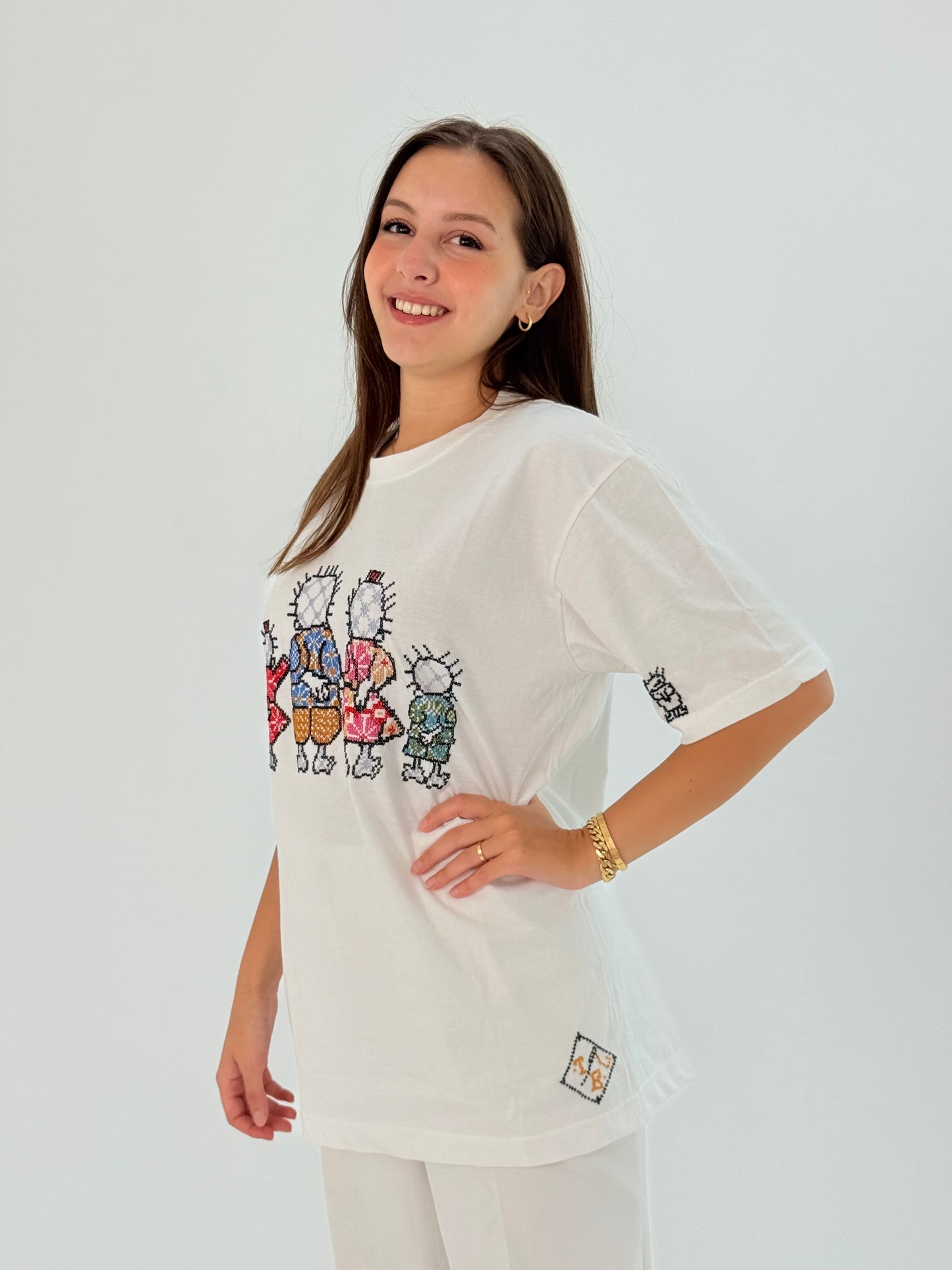 White cotton t-shirt with Handhala design, representing iconic and thought-provoking cultural symbolism.