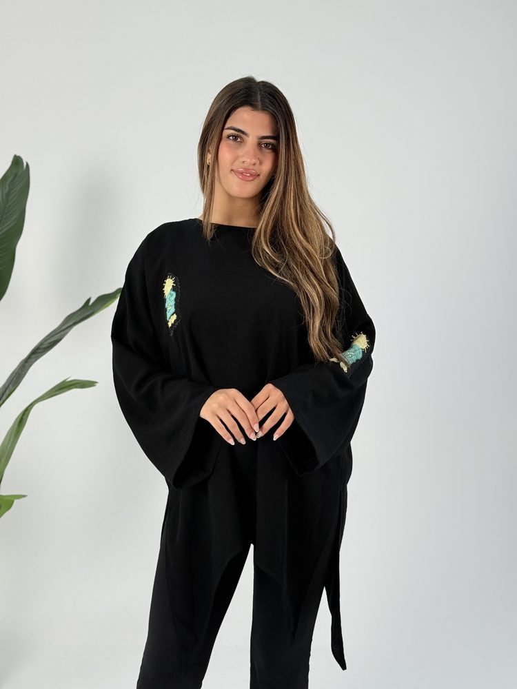 Hand-embroidered Handala and Al-Quds motifs on the Wallada black free-size top