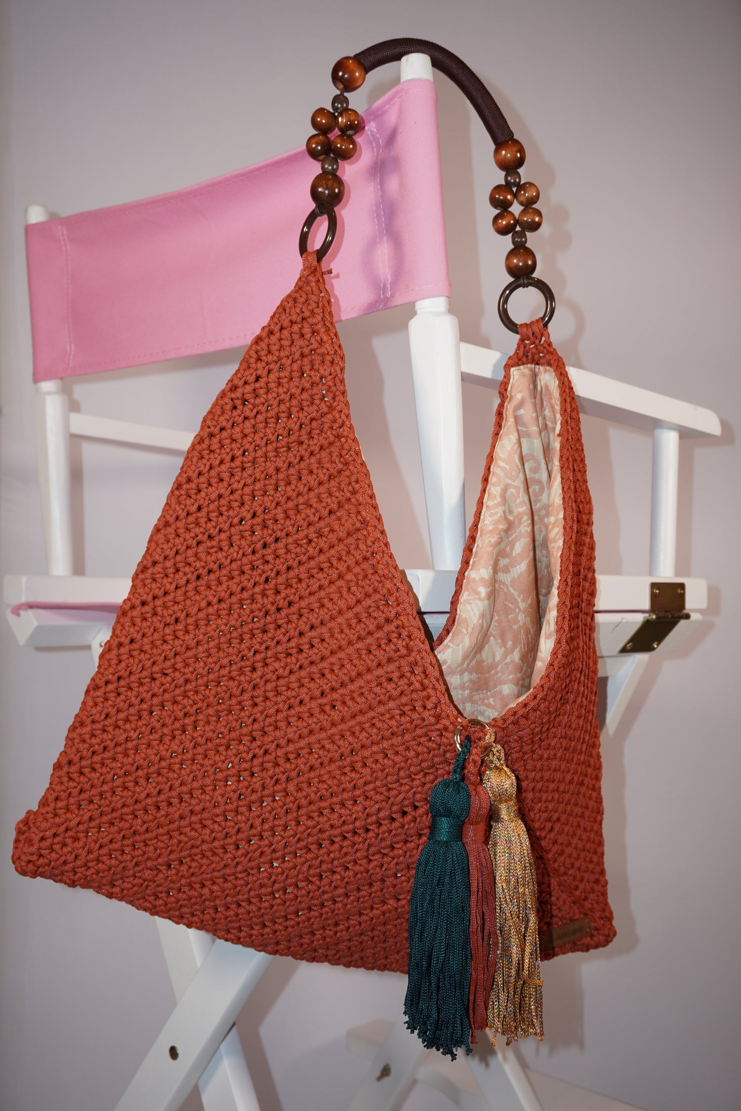 Handmade crochet bag in brick terracotta color with multicolor tassels, limited edition artisan shoulder bag, perfect for everyday use