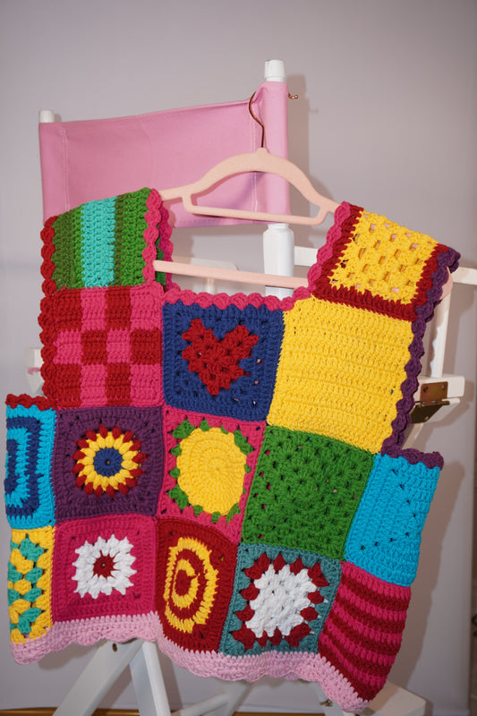Handmade sleeveless crochet top in bright multicolor squares, crafted by women artisans.