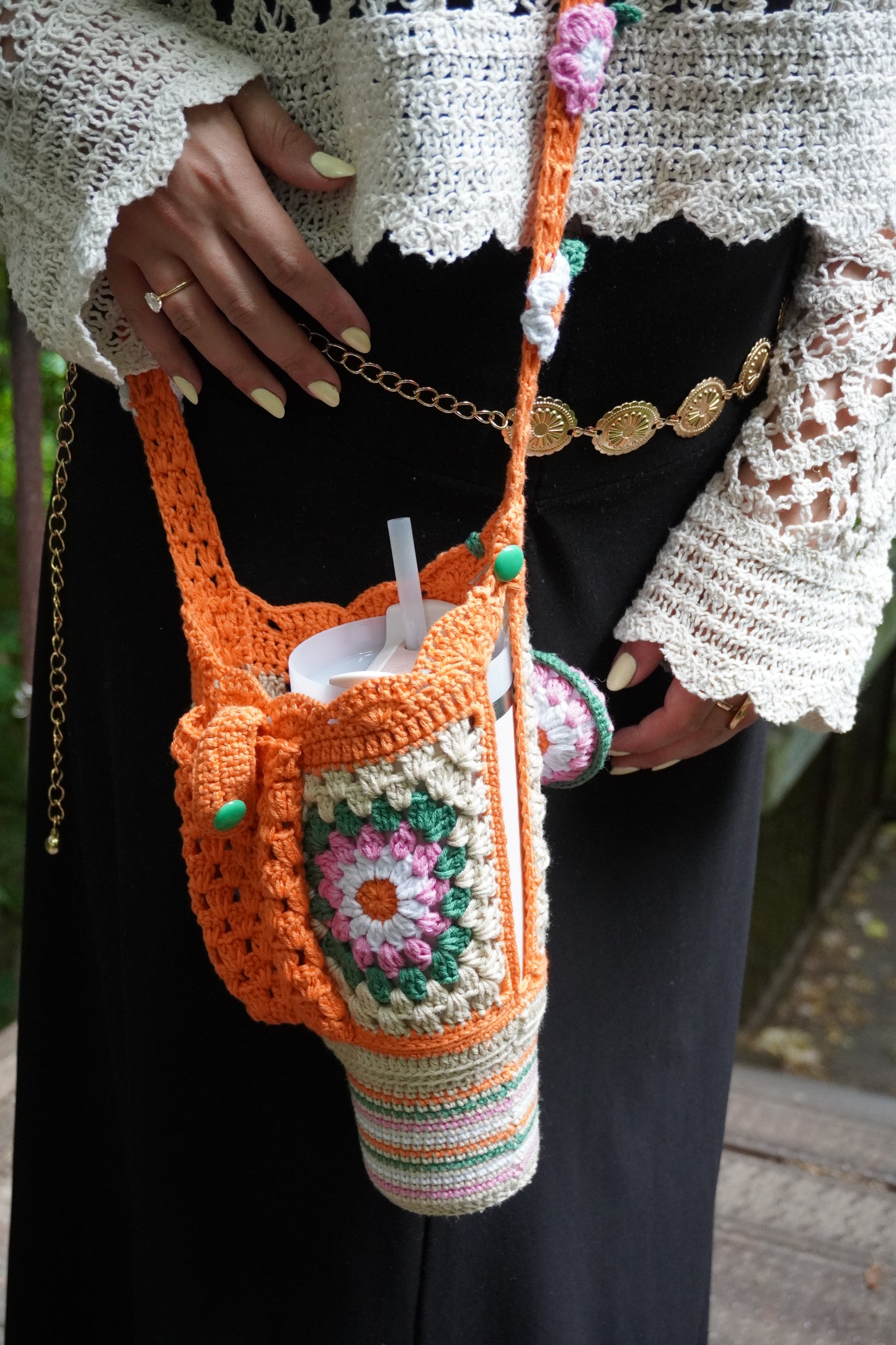 Handmade Crochet Stanley Bottle Cover – Beige with Yellow Flowers, Pocket & Carry Strap | Fits 30ozHandmade Crochet Stanley Bottle Cover – Orange Flowers with Green and White Combination | Fits 30oz