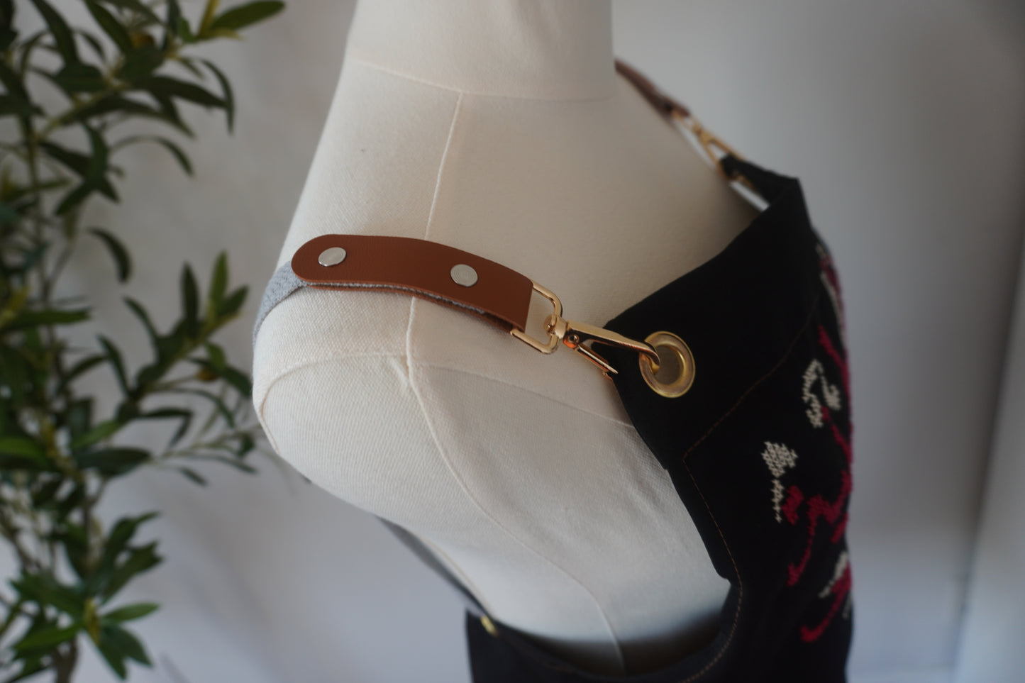 Adjustable Grey-Strap Apron with Hand-Embroidered Palestinian Felestenea Madala Design in Red and White"