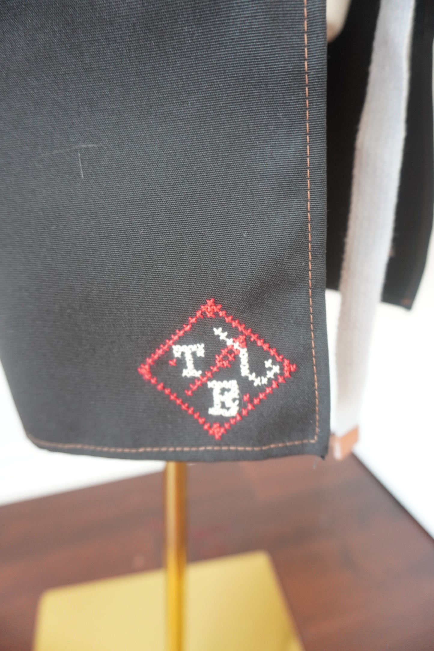 Adjustable Grey-Strap Apron with Hand-Embroidered Palestinian Felestenea Madala Design in Red and White"