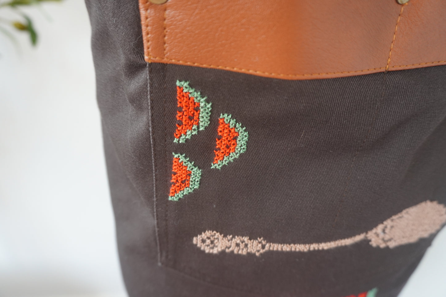 Brown Apron with Spoon and Watermelon Slices on the Pocket and Watermelon Design on the Lower Part for Kitchen or Barbecue Gatherings