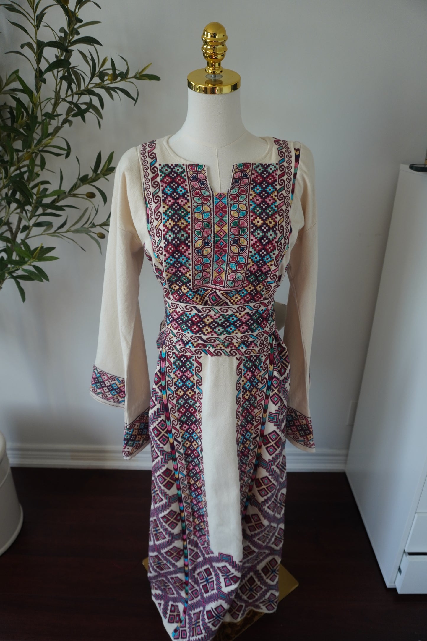 Exquisite Hand-Made Off-White Thoub with Vibrant Blue, Fuchsia, Green, Light Green, Pink, and Dark Purple Embroidery from Yata Al Khalil