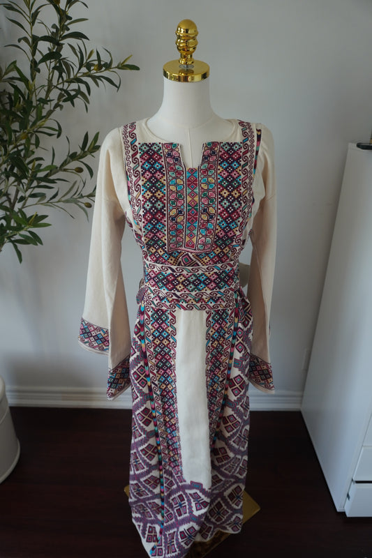 Exquisite Hand-Made Off-White Thoub with Vibrant Blue, Fuchsia, Green, Light Green, Pink, and Dark Purple Embroidery from Yata Al Khalil