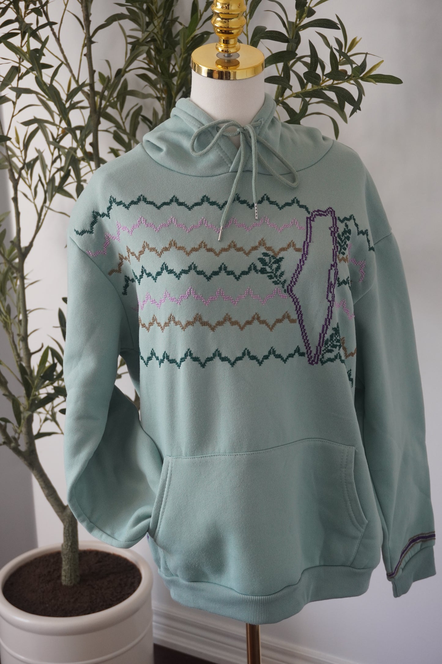 Medium light green hoodie made from cotton and polyester, featuring a Kofea-inspired design and a Palestinian map, one of a kind and handmade.