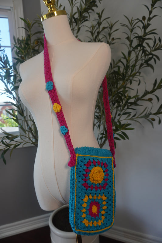 Colorful Handmade Crochet Phone Case - Fuchsia, Yellow, and Blue Floral Design
