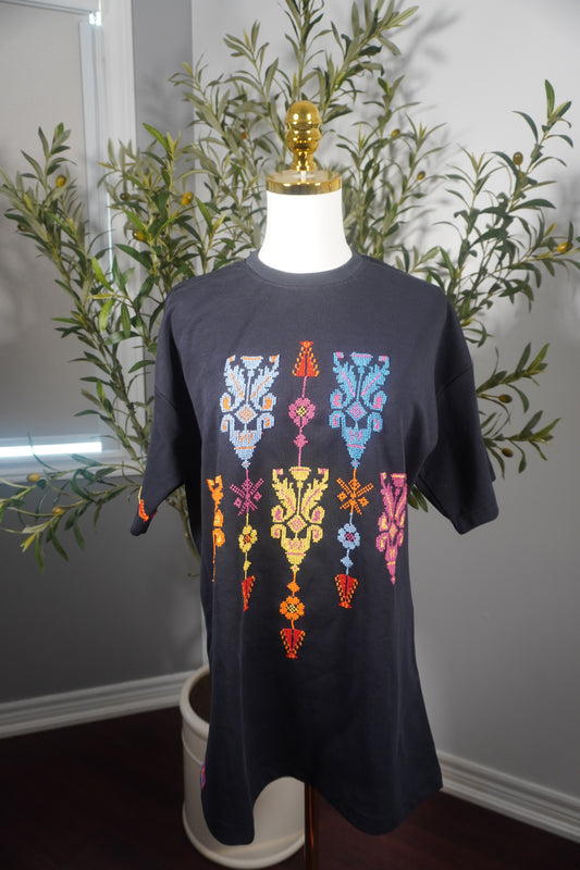 Navy oversized t-shirt with Kasat Tareez design, showcasing vibrant colors and unique craftsmanship by talented artisans.