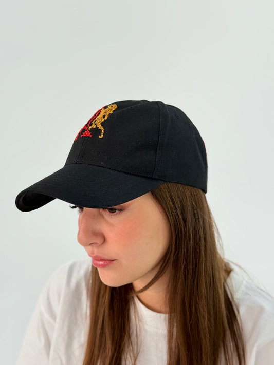 Black cap hat with two lion tatreez patterns in handmade embroidery.