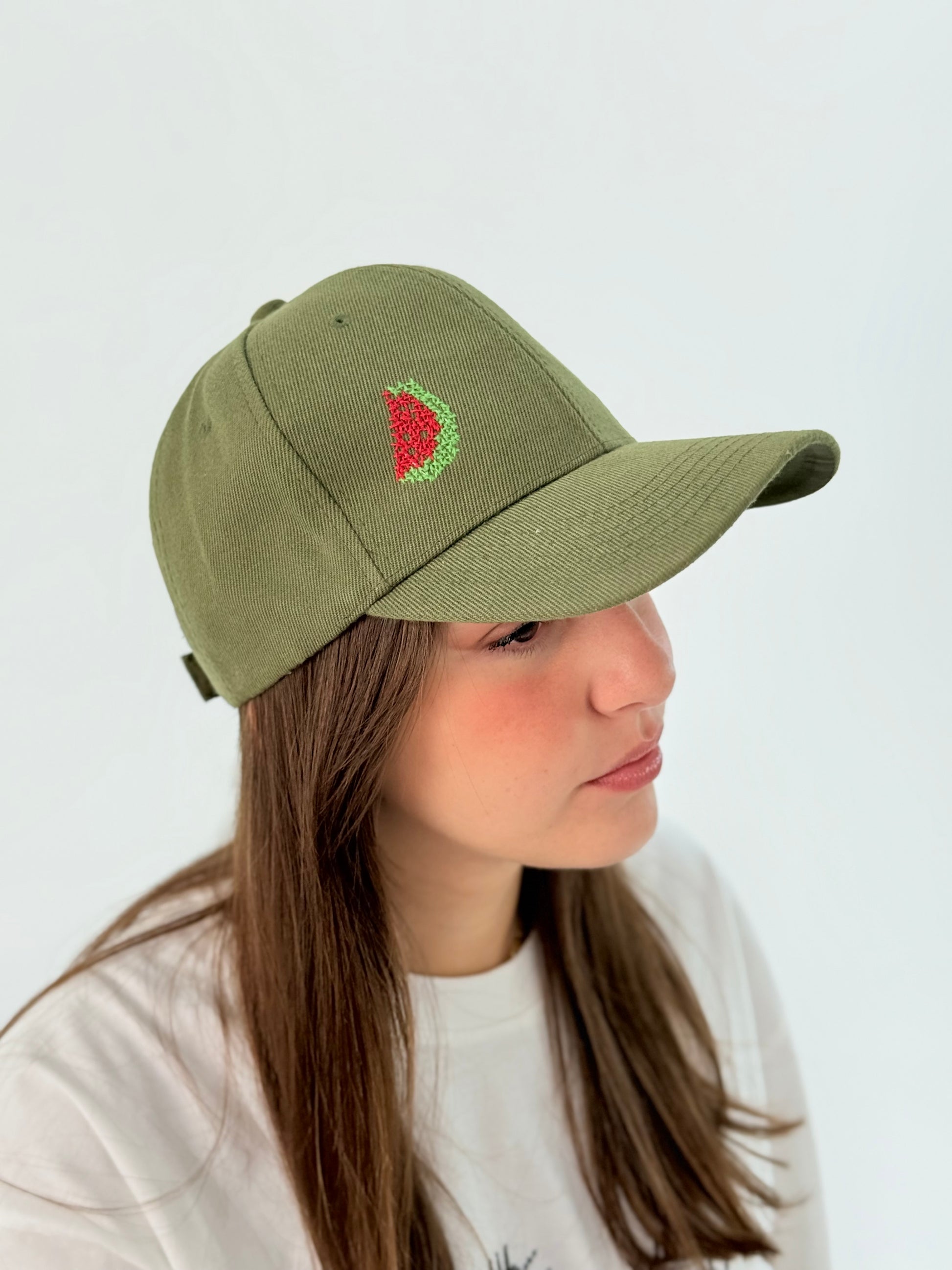 Olive cap hat with embroidered watermelon.