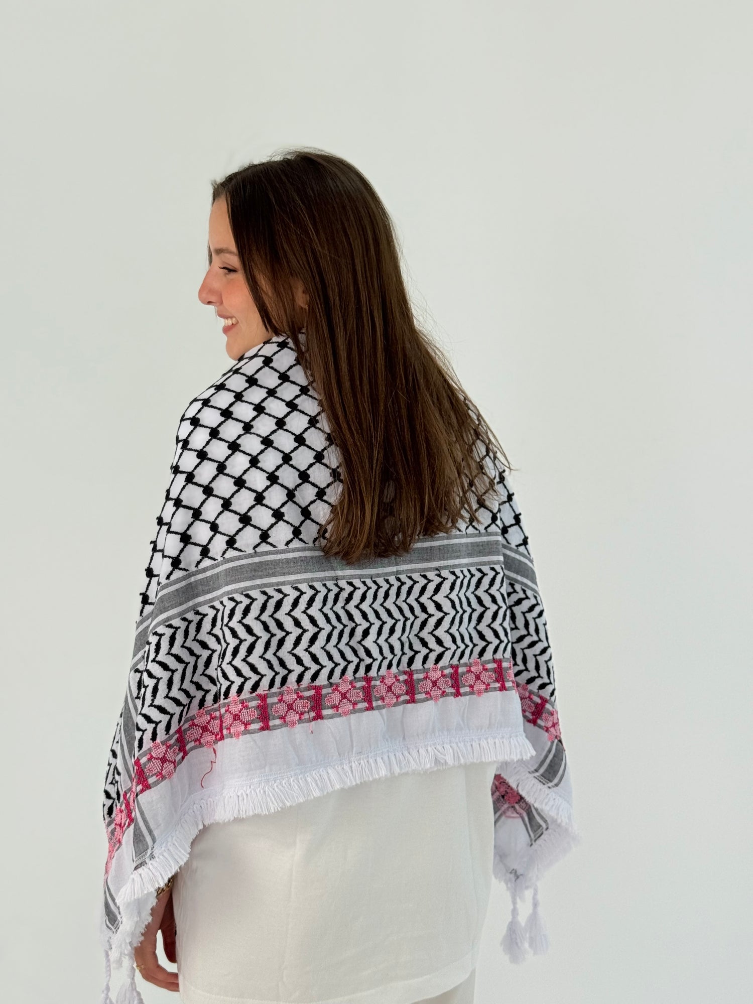 Handmade Kofea embroidered with beautiful flowers, highlighting elegance and intricate craftsmanship.