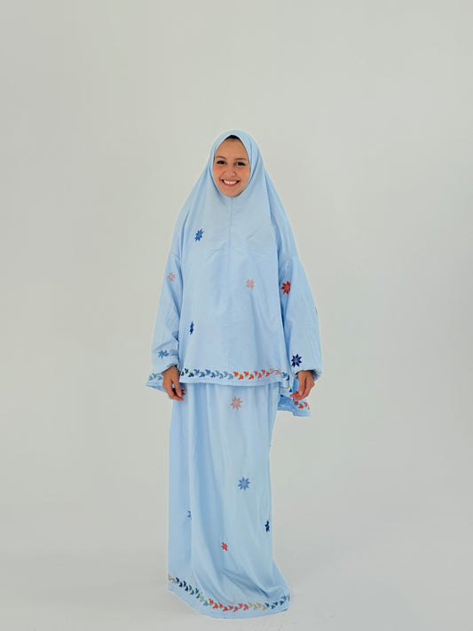 Handmade baby blue two-piece prayer set with sleeves, featuring star-shaped embroidery, a khimar, and an elastic-waist skirt