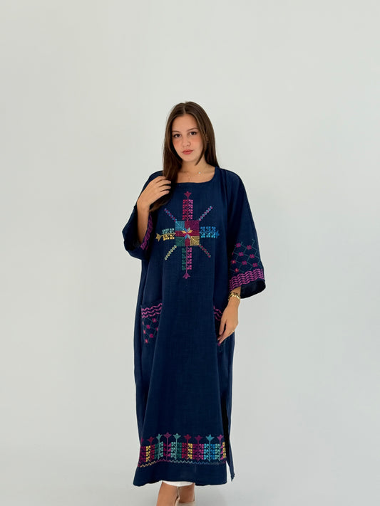 Handmade linen dress featuring Kofea and Tatreez patterns, suitable for daily wear and Ramadan events.