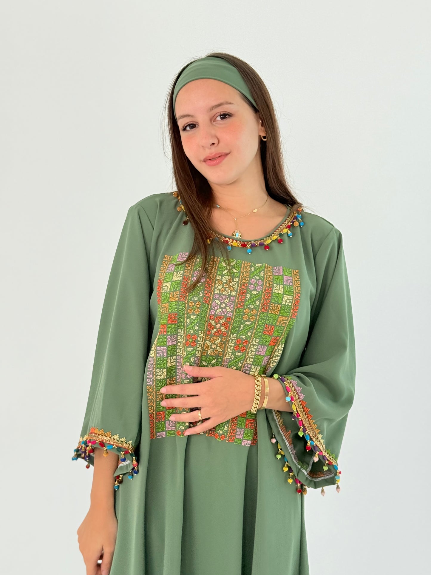 Handmade Green Crepe Georgette Dress with Middle Embroidery & Tassel Details