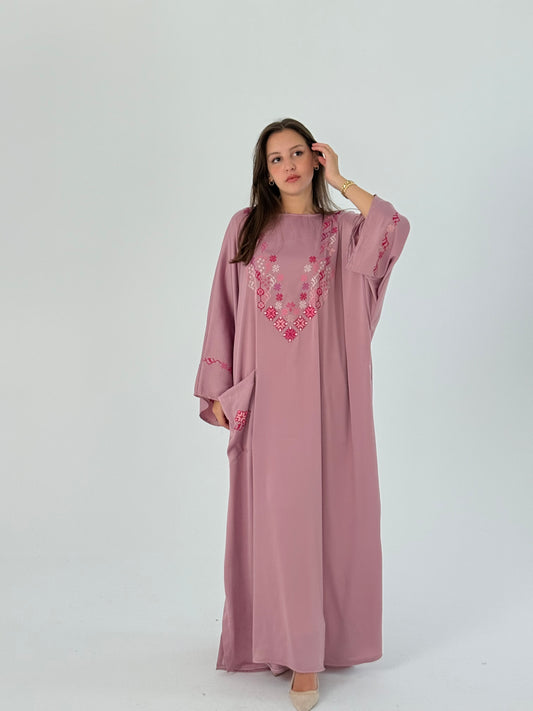Handmade pink abaya in soft silk with elegant embroidery, offering a classy and free-size design.