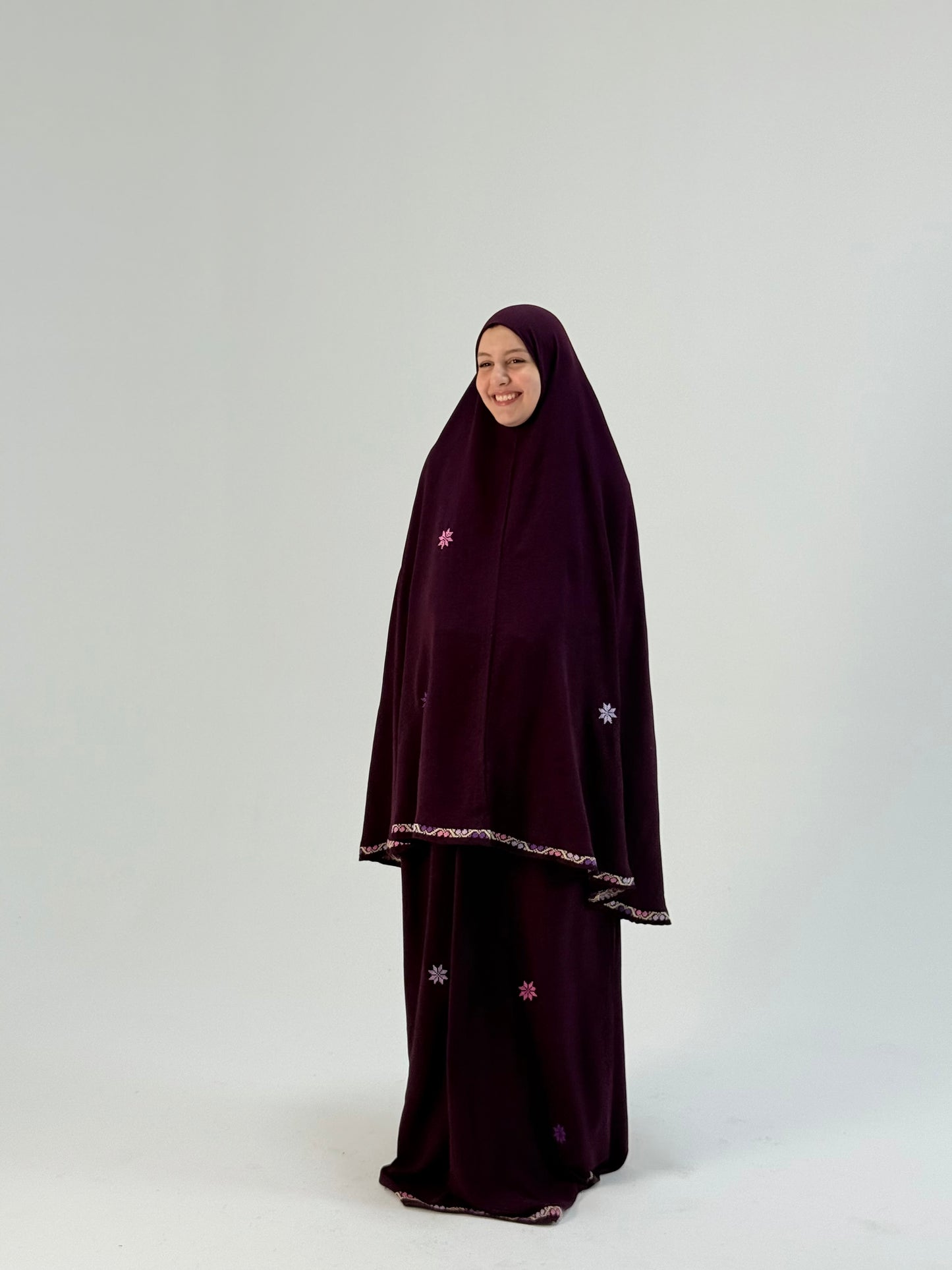 Purple adult prayer clothes with handmade embroidery, soft and airy, crafted by women artisans.
