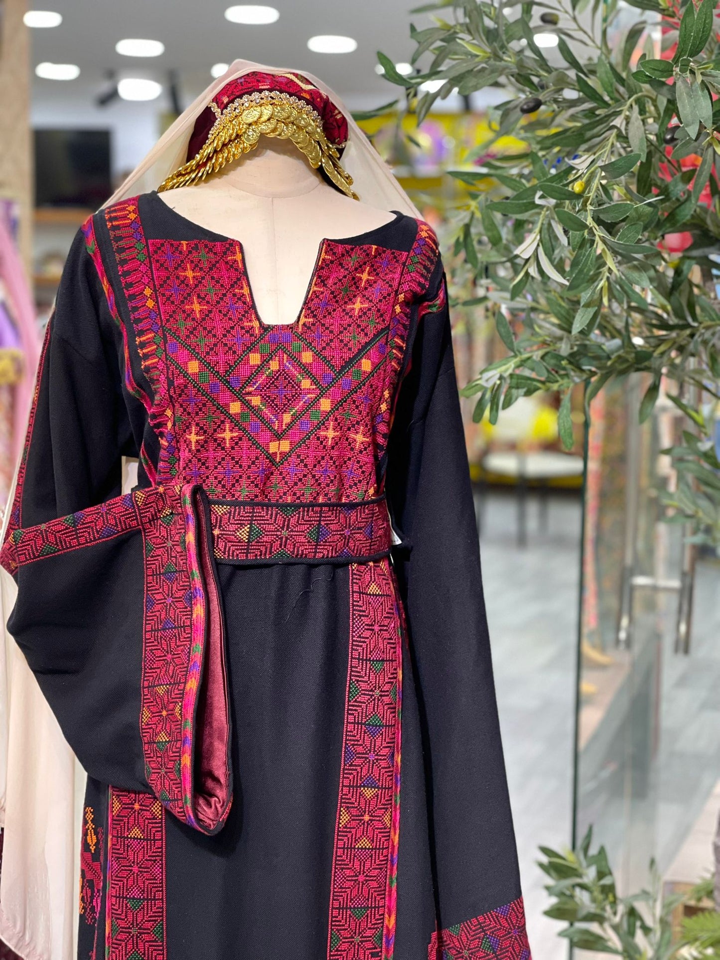 Stunning Handmade Black Thoub with Vibrant Palestinian Embroidery from Yata Al Khalil