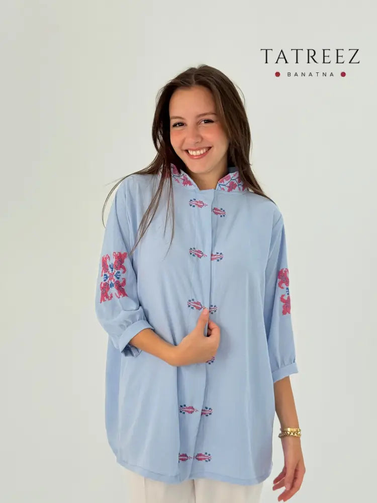 Baby blue cotton top shirt with modern navy and blue fusion embroidery, handmade for everyday wear.