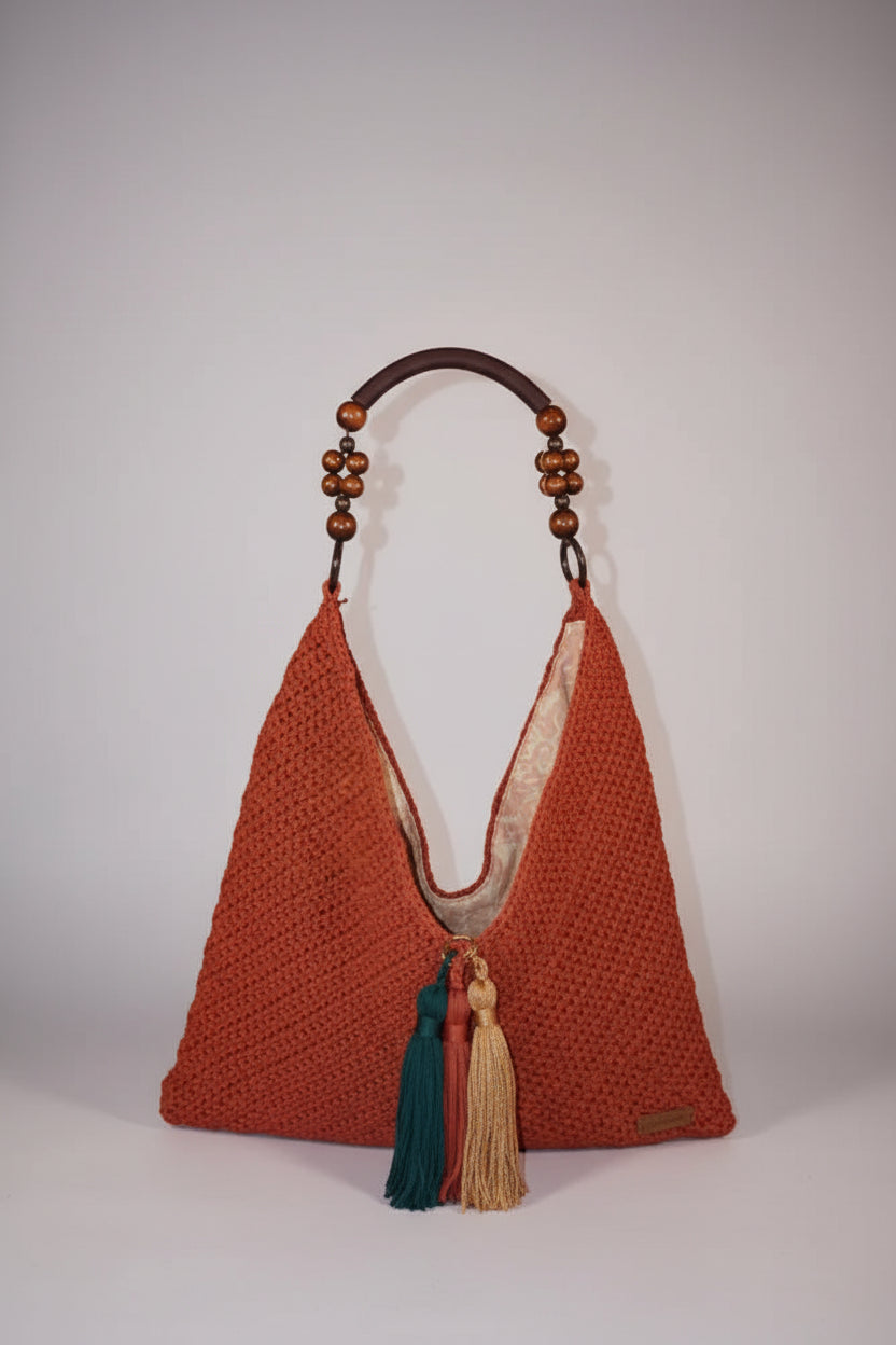Handmade crochet bag in brick terracotta color with multicolor tassels, limited edition artisan shoulder bag, perfect for everyday use