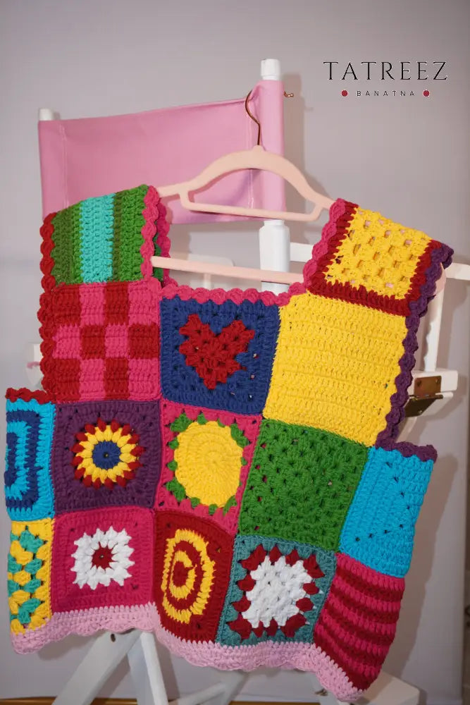 Handmade sleeveless crochet top in bright multicolor squares, crafted by women artisans.