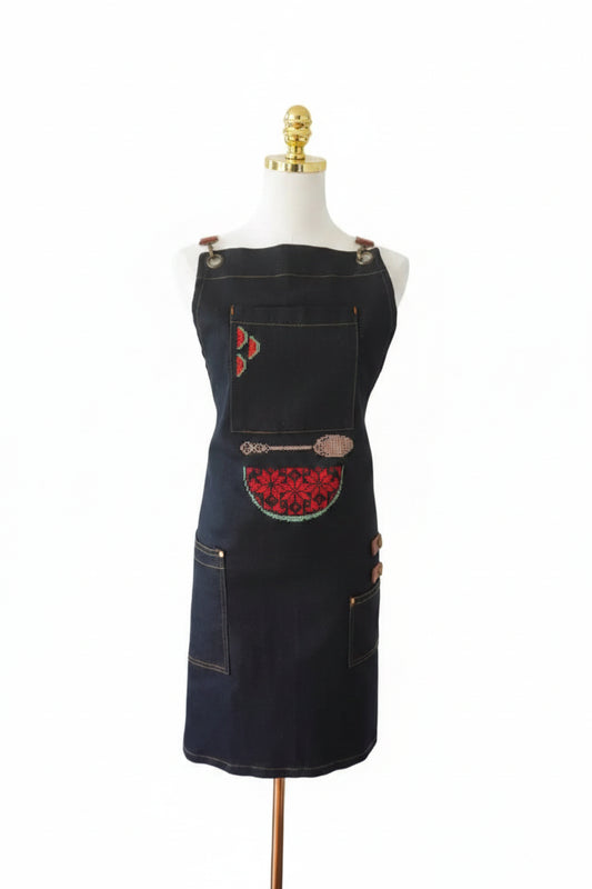 Denim apron featuring a watermelon design and beige spoon embroidery, perfect for cooking at events or barbecues.