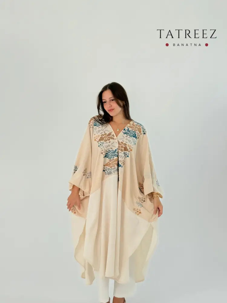 Handmade off white kimono made from crepe georgette with brown and blue embroidery, measuring 45 cm in width and 62 cm in length.