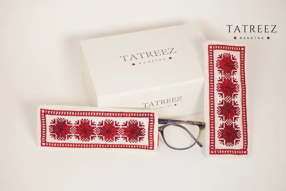Handmade Palestinian tatreez embroidered eyeglasses case with red geometric cross-stitch, artisan glasses pouch, cultural heritage accessory