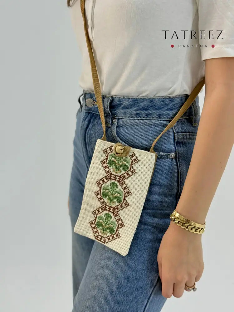 Handmade Palestinian tatreez embroidered eyeglasses case with cross-stitch floral patterns, artisan shoulder pouch for glasses, cultural accessory