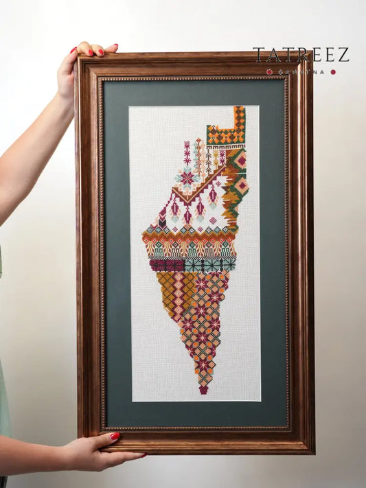 Handmade Palestinian tatreez framed portrait of the map of Palestine with colorful embroidery, symbol of identity and heritage