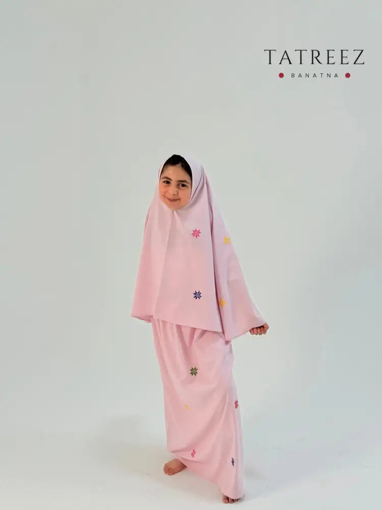 Light pink girls’ prayer outfit with colorful hand-embroidered flowers, two-piece airy design, suitable for age 10