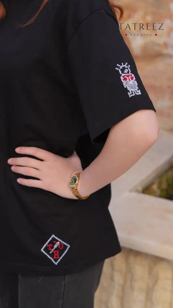Handhalla Black T-Shirt: A Mother’s and Everywoman’s Embrace of Palestine - Clothing & Wearables