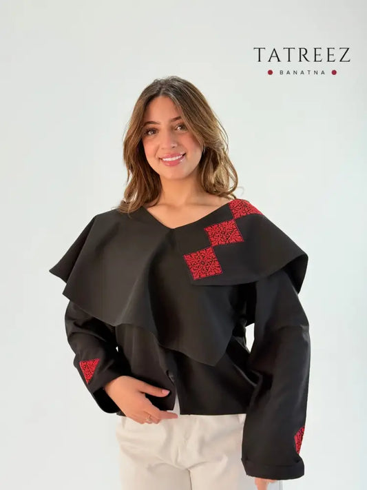 Handmade black long-sleeve top with beautiful layers and Palestinian embroidery on one side, made from crepe georgette, displayed with measurements for sizing.