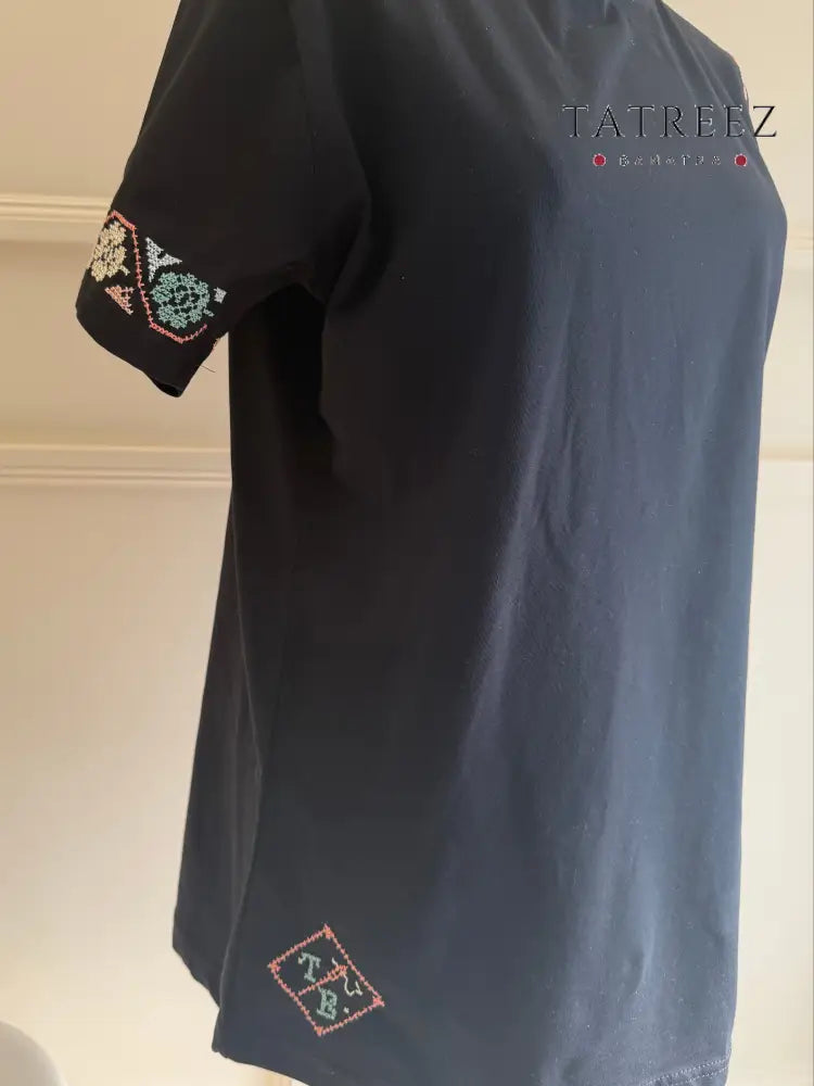 Harmony T-Shirt: Modern Black Tee with Hand Embroidered Flowers in Light Teal & Peach Clothing & Wearables