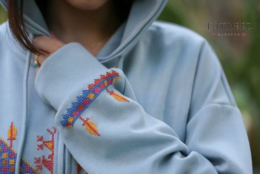 Heritage Zipper Hoodie: Light Blue with Vibrant Handmade Embroidery & Simple Tradition Clothing & Wearables