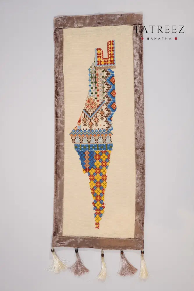 Handmade large embroidered Mo’allaqa wall hanging featuring the map of Palestine in colorful tatreez, crafted by Palestinian women artisans.