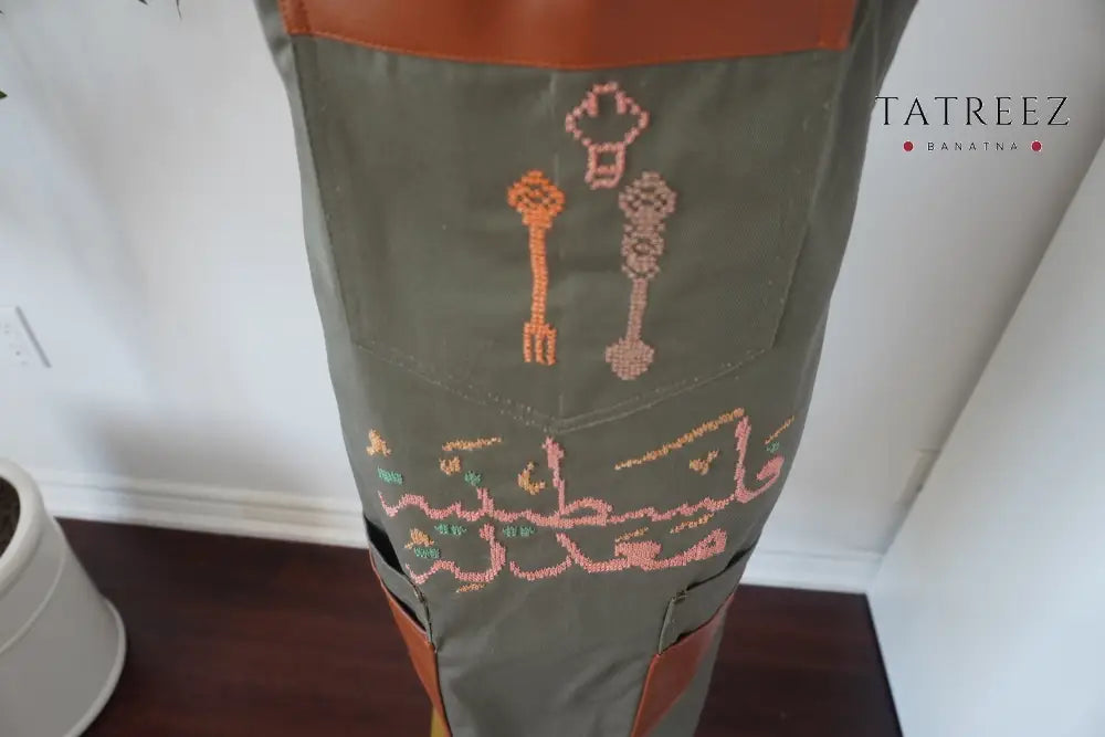 Olive Green Apron with Hand-Embroidered Palestinian Motif Peach and Brown Spoons – Super Beautiful and Cute Clothing &