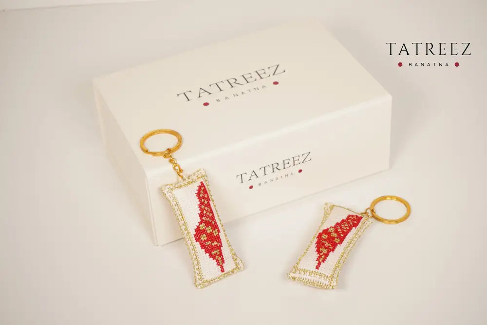 Handmade Palestinian tatreez keychain with embroidered Palestine map design, artisan accessory, cultural heritage symbol