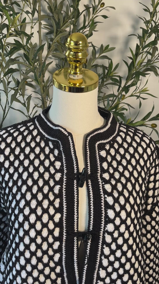 Handmade cardigan with kofeya design, exquisite craftsmanship, showcasing traditional Middle Eastern patterns.