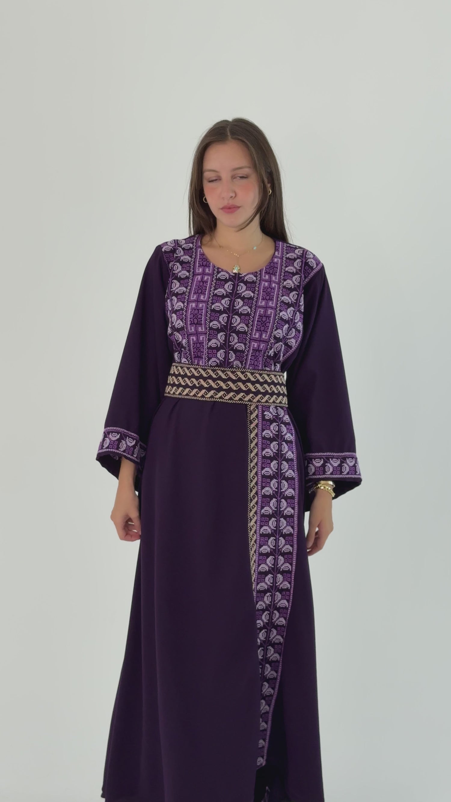 Handmade lilac thobe in Crepe Georgette, designed by Tatreez Banatna, featuring Palestinian embroidery and a stylish belt, size 136cm chest, 145cm length.