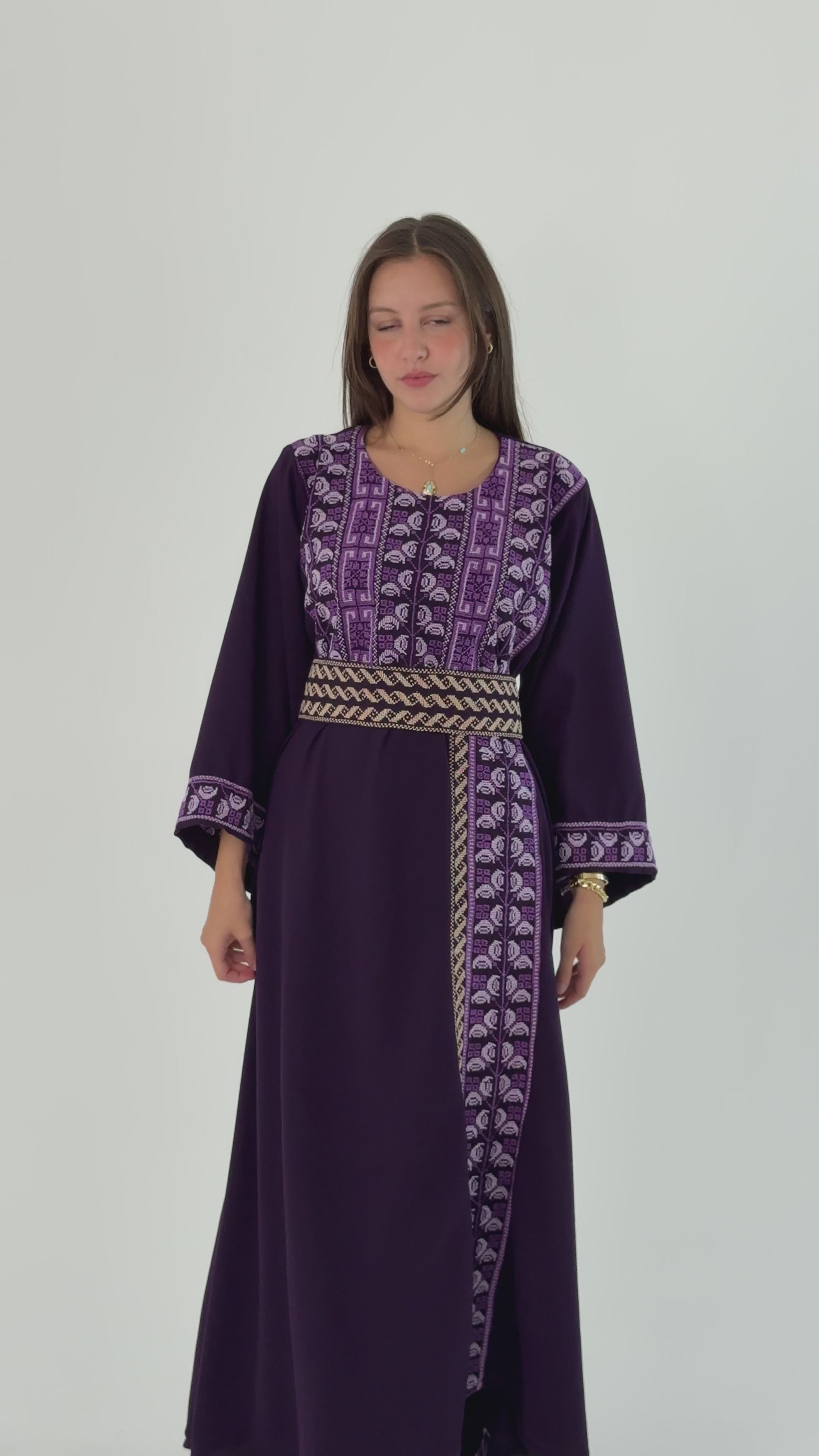 Handmade lilac thobe in Crepe Georgette, designed by Tatreez Banatna, featuring Palestinian embroidery and a stylish belt, size 136cm chest, 145cm length.