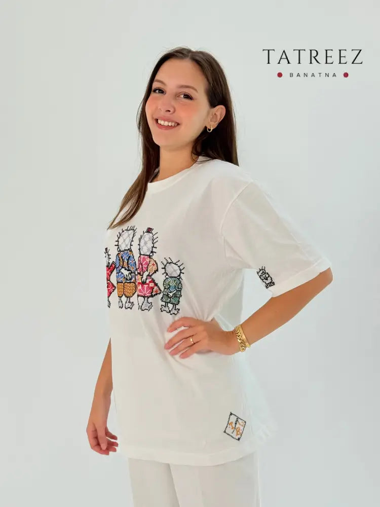 White cotton t-shirt with Handhala design, representing iconic and thought-provoking cultural symbolism.