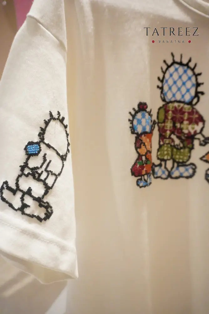 Hand-Embroidered Handhala Over Size T-Shirt -White– Cultural Heritage Wear | Tatreez Banatna Clothing & Wearables