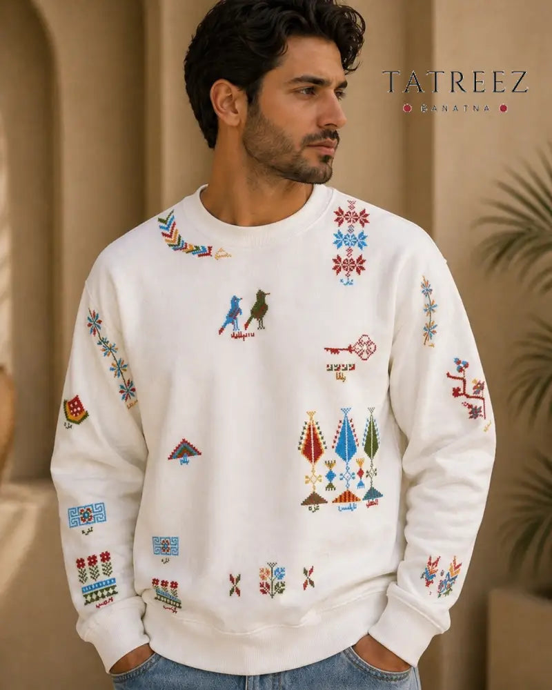 White Sweatshirt – Handmade Vibrant Palestinian Tatreez Motifs - Clothing & Wearables
